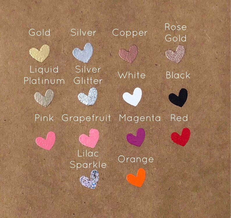 May include: A chart of heart-shaped paint samples with different colours and finishes, including gold, silver, copper, rose gold, liquid platinum, silver glitter, white, black, pink, grapefruit, magenta, red, lilac sparkle, and orange.