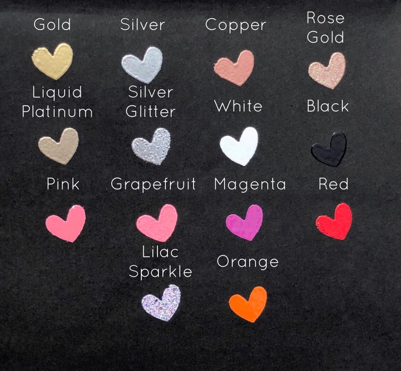 May include: A chart of heart-shaped paint samples in various colours, including gold, silver, copper, rose gold, liquid platinum, silver glitter, white, black, pink, grapefruit, magenta, red, lilac sparkle, and orange.
