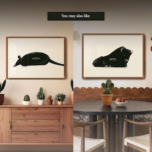 May include: Two framed black and white illustrations of animals. The left illustration shows an armadillo with the word "ARMADILLO" printed below. The right illustration shows a bison with the word "BISON" printed below.