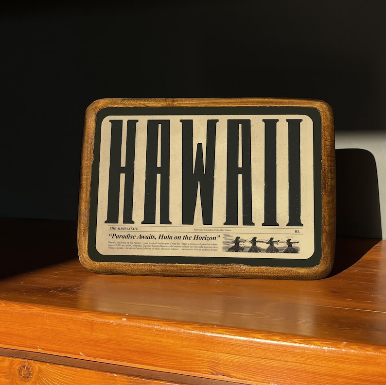 Handcrafted wooden sign of Hawaii with retro typography, ideal for rustic and vintage decor.
