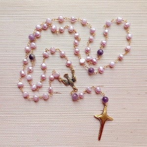 Beautiful Artisan Wire Wrapped Rosary with Pinkish Purple Pearl, Amethyst Gold Finish Center and Crucifix