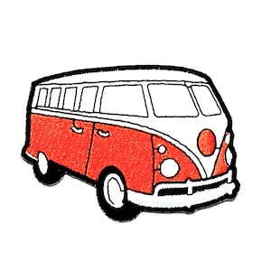May include: Embroidered patch featuring a red and white vintage van with black accents. The van has a classic design with a rounded front, windows, and wheels. The patch is likely for clothing or accessories.
