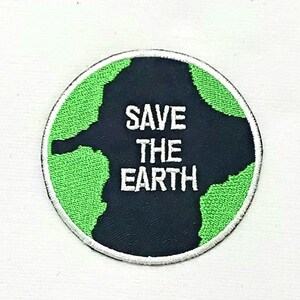 May include: Circular patch featuring a black and green earth design with the words "SAVE THE EARTH" in white. The patch has a white border and is designed to be sewn or ironed on.