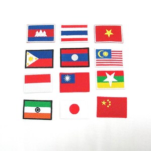 Puede incluir: Un conjunto de 12 parches bordados para planchar con las banderas de varios países, entre ellos Camboya, Tailandia, Vietnam, Filipinas, Laos, Malasia, Indonesia, Taiwán, Myanmar, India, Japón y China.