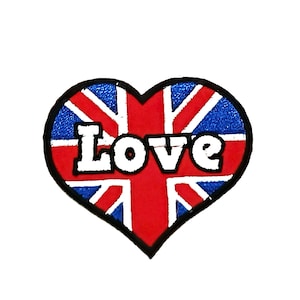 May include: A heart-shaped patch with the Union Jack flag design in red, white, and blue. The word "Love" is written in white block letters across the center of the flag. The patch has a black border.