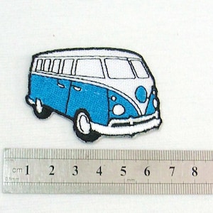 May include: Embroidered patch featuring a blue and white vintage van design. The patch has a black outline and measures approximately 3 inches in length. Ideal for adding to clothing or accessories.