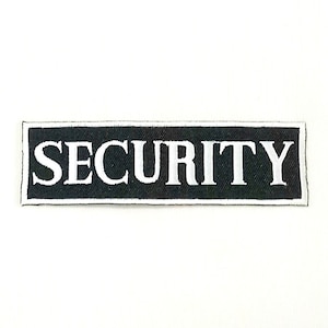 May include: Black and white embroidered patch with the word "SECURITY" in white lettering.