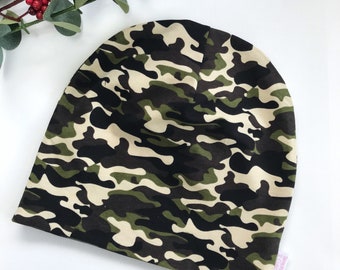 May include: A green, black, and beige camouflage beanie hat.