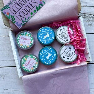 Blue washi tape with white illustrated woodland animals and leaves