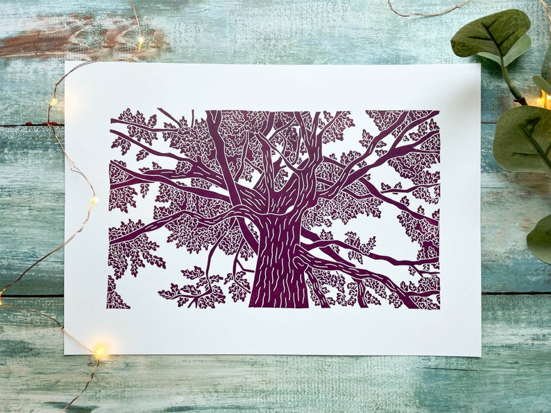 A plum coloured lino print of an oak tree. The perspective is from standing underneath the tree looking up to the top of it.