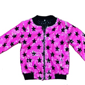 May include: A pink bomber jacket with black star sequins. The jacket has a zipper closure and ribbed cuffs and hem.