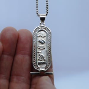 Put Your hieroglyphic Name with Silver or 18 Karat Gold Symbols if you like On Elegant Silver CARTOUCH.