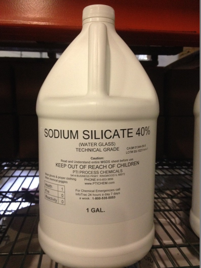 May include: A white plastic gallon jug of Sodium Silicate 40% (Water Glass) Technical Grade. The label includes safety information, contact information, and the text "KEEP OUT OF REACH OF CHILDREN".