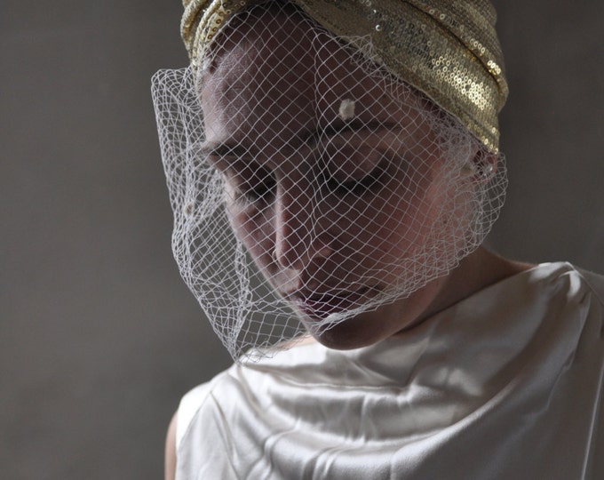 Sequined gold wedding turban with birdcage veil