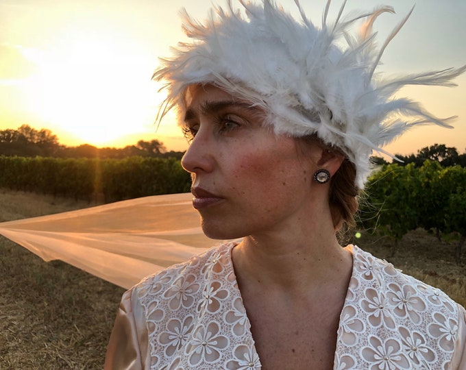 Vintage inspired headpiece with feathers and attached veil