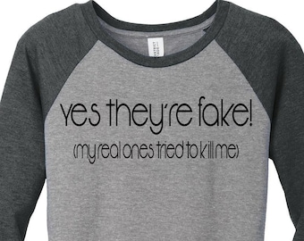 Yes They're Are Fake, My Real Ones Tried To Kill Me Breast Cancer Baseball Raglan, Breast Cancer Shirt, Plus Size Breast Cancer shirt