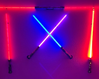 Lightsaber Cross Mounts, Galaxy&#39;s Edge lightsaber Cross wall mounts