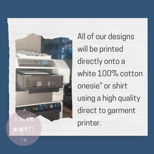 May include: A close-up of a white direct-to-garment printer. The printer is used to print designs onto white 100% cotton onesies and shirts. The text "3 little piglets co." is visible in the lower left corner of the image.