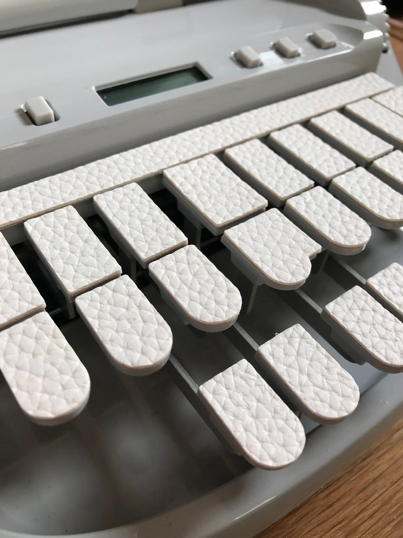 Bkack, White, Gray Faux Leather Steno Textured Keypads Off White