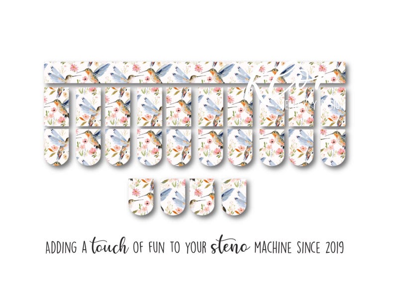 May include: Hummingbird and floral design steno machine keycaps. The keycaps feature a watercolor design of hummingbirds, flowers, and leaves in shades of pink, blue, and green. The text "Adding a touch of fun to your steno machine since 2019" is also visible.