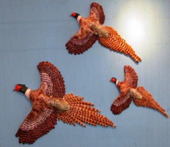 Ceramic wall hanging flying birds. A Bouquet of Pheasants plaque.