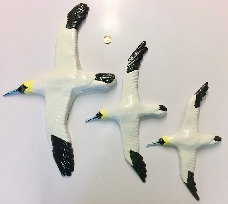 Ceramic Wall Hanging Flying Birds. A Company of Etsy UK