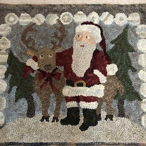 May include: A rectangular Christmas rug featuring Santa Claus and a reindeer. Santa wears a red suit with a white beard and black boots. The reindeer has antlers and a red bow. Green trees and a snowy border complete the design.
