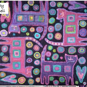 May include: Hand-hooked textile art featuring stylized cats in pink and purple, with geometric patterns and colorful circles on a black background. The artwork includes the text "hooked by Cheryl Bell" and the word "MAKA".
