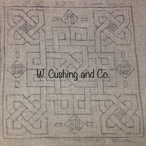 May include: A close-up of a beige canvas with a black and white geometric pattern. The pattern is a complex knot design. The text "W. Cushing and Co." is printed in the center of the canvas.
