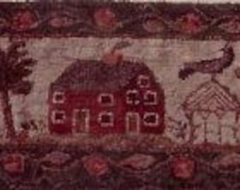 May include: A vintage needlepoint rug depicting a red house with white windows and a chimney, a tree, a bird, and flowers. The rug has a brown border with red flowers.