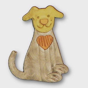 May include: A metal dog-shaped brooch with a yellow head and a heart-shaped design on its chest. The dog's body is silver with a textured pattern. A charming and whimsical accessory.