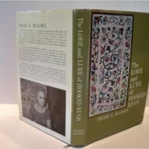 May include: The Lore and Lure of Hooked Rugs by Pearl K. McGown, a book with a green cover and a colorful hooked rug design on the front. The back cover features a black and white photo of the author.