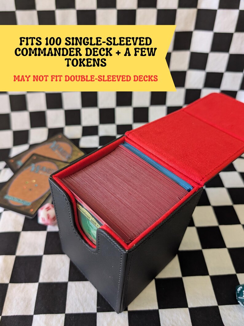 May include: Black and red card deck box, open to reveal a stack of cards. The box is labeled to fit 100 single-sleeved Commander decks and a few tokens. The background is a black and white checkered pattern.
