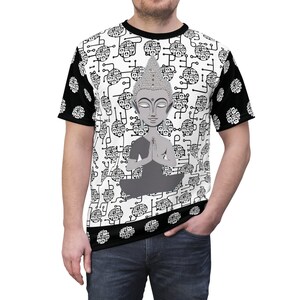 May include: A black and white t-shirt with a graphic print of a meditating Buddha surrounded by peace signs. The Buddha is gray and the peace signs are black.
