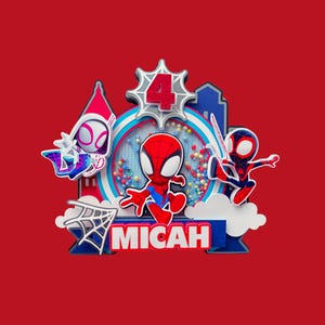 May include: A red, white, blue, and silver Spider-Man themed cake topper with the name "Micah" and the number "4". The design features cartoon versions of Spider-Man, Spider-Gwen, and Miles Morales.