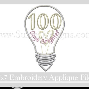 May include: A light bulb embroidery design with the text "100 Days Brighter" and a heart inside the bulb.