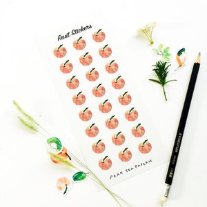 May include: A sheet of peach fruit stickers with the text "Fruit Stickers" and "Pear Tea Paperie". The stickers are watercolor illustrations of peaches.
