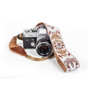 white camera strap