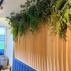 Luxury faux greenery garland with trailing ferns and layered foliage
