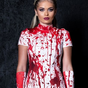 carrie prom dress blood God Save the Prom Queen: The Enduring Legacy of Carrie White's Pink Prom Dress FAST at UCLA