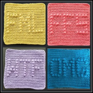 May include: Four crocheted squares with a heart design in different colours: yellow, pink, purple, and blue.