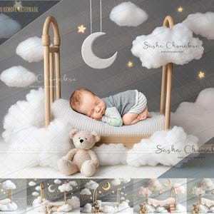 May include: A newborn baby sleeping on a white, fluffy cloud bed with a teddy bear. The bed is made of wood and has a white and grey striped mattress. The background is a grey wall with white clouds and stars.