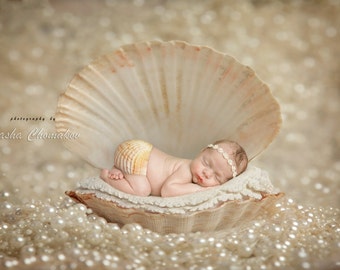 Pearls newborn baby girl or todler sea seen mermaid