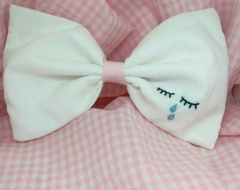 Sad eyes cry baby embroidered bow