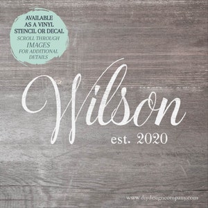 May include: White cursive text on a gray wood background reads "Wilson est. 2020".  A small circle with light blue text in the top left corner reads "Available as a vinyl stencil or decal. Scroll through images for additional details."