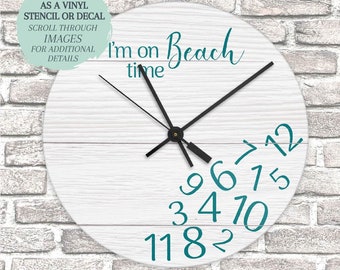 May include: White round clock with black hands and teal numbers. The clock face has a white woodgrain background and the text "I'm on Beach time" in teal.