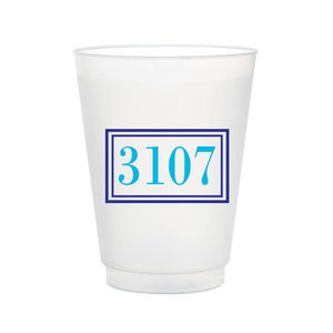 May include: White plastic cup with a blue border around the number 3107 printed in blue.