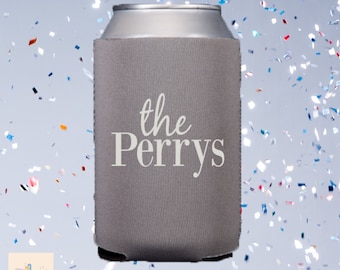 May include: Grey can cooler with the text "the Perrys" in white lettering.