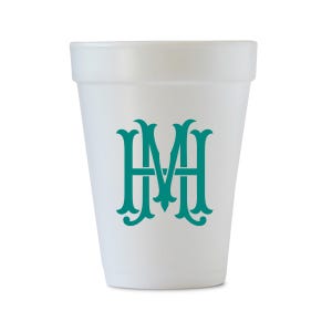 May include: White foam cup with a teal monogram of the letters "MH" in a decorative font.