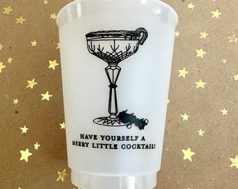 Vasitos de plástico con diseño navideño escarchado, ideales para las fiestas. Color negro. Juego de 10.